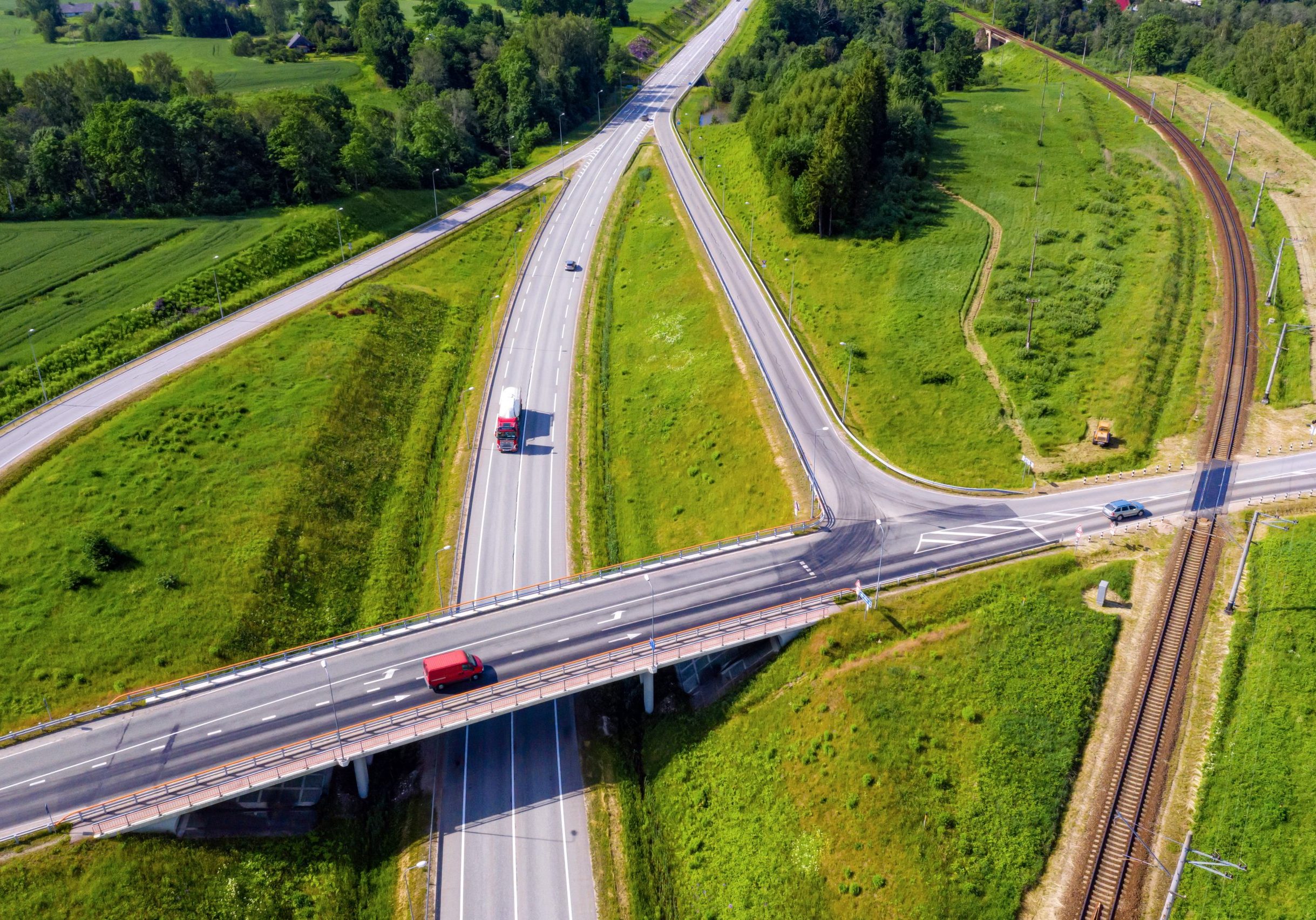 aerial top view of the multi-level intersection of the Latvian national highway A1 (part of the European route E67 - Via Baltica) near Skulte, Latvia
