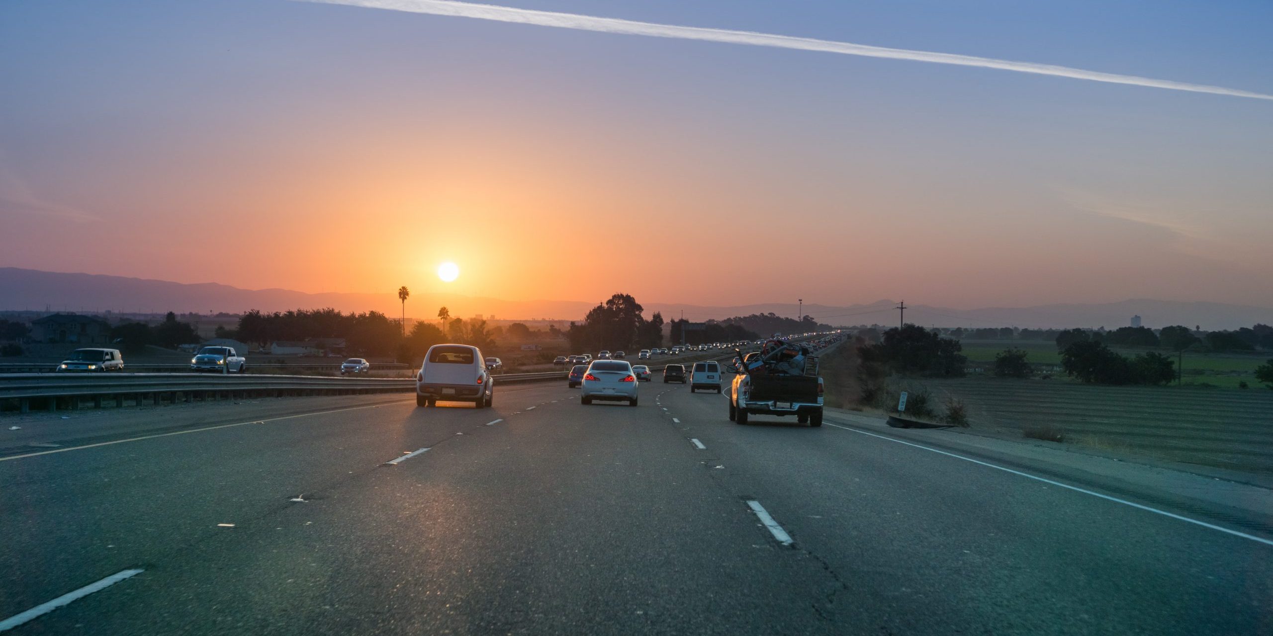 Cars driving on the highway at sunset, San Francisco bay area, California